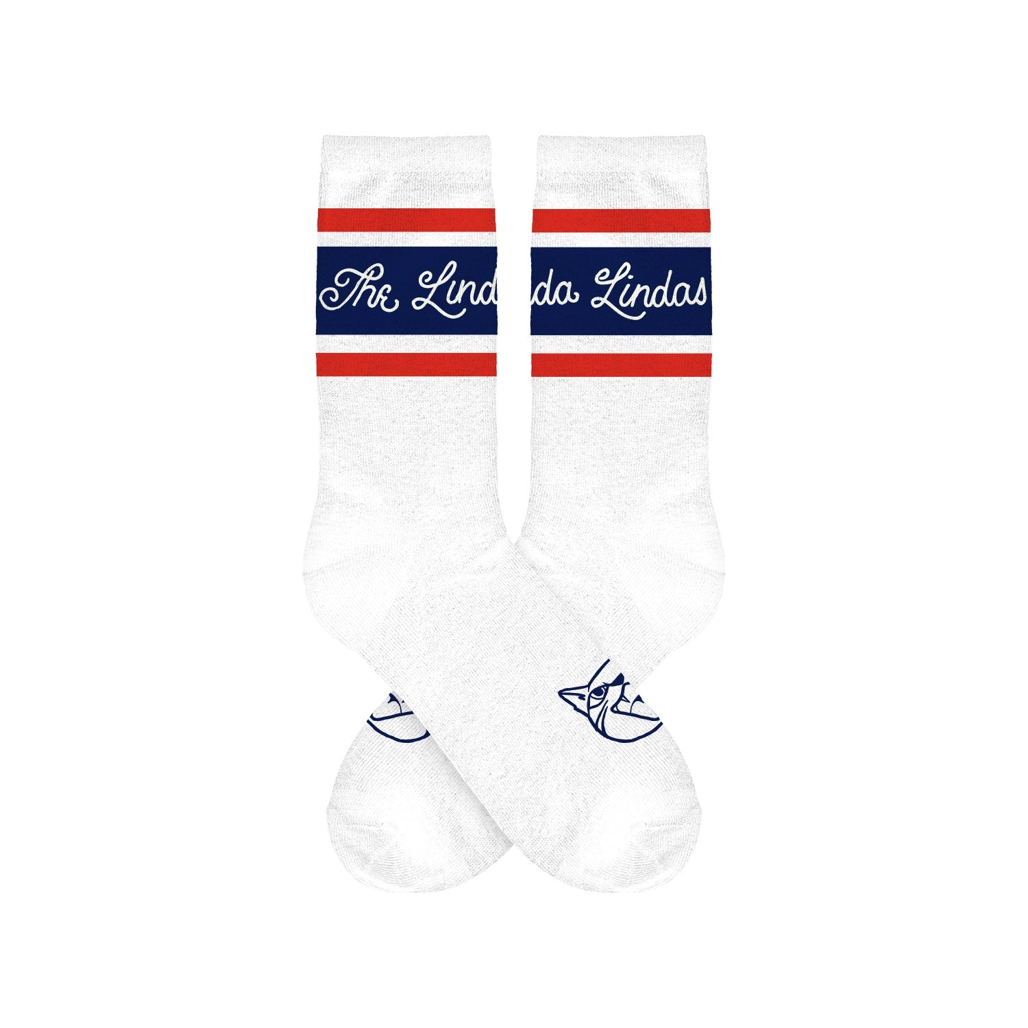 White knit socks by The Linda Lindas with red and navy stripes, “The Linda Lindas” in cursive across the top, and a small blue cat illustration on the toes—ideal for fans of cozy cat-themed socks.