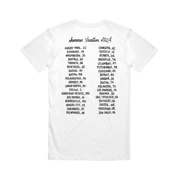 The Linda Lindas white t-shirt features "Summer Vacation 2024" on the front and a list of U.S. and Canadian cities and states on the back, styled like a classic tour shirt to commemorate your epic summer journey.