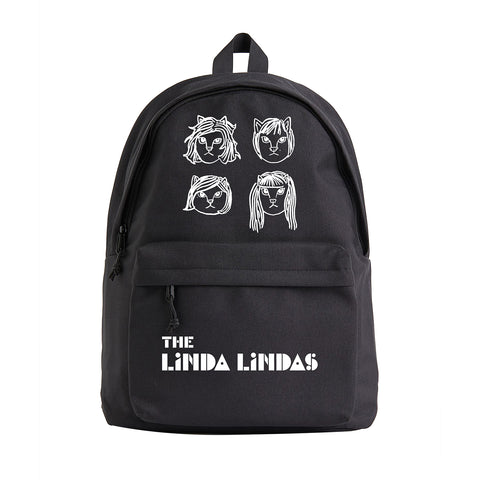 image of a black backpack on a white background. backpack has white print on th etop of four cat faces representing the 4 female members of the band. the bottom says the linda lindas