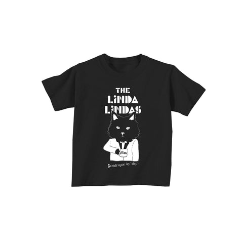 Image of a black tshirt against a white background. The Center of the shirt says the linda lindas in white blocky text. Below that is a graphic of a black cat from the waist up. The cat is wearing a suit and holding a cup of coffee. The coffee cup says "Nino". Below this in thin white text reads "gentleman by day".