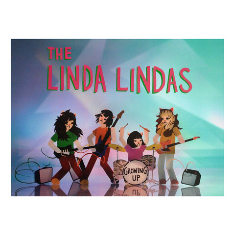 Image of a poster against a white background. In a red/pink text with a green outline reads "the linda lindas". Below that is an image of 4 colorful cartoon characters representing the linda lindas playing guitar, bass, and drums. in black text, The bass drum says growing up. The background on the poster is a mix of blue, purple, and green.
