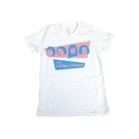 image of a white tee shirt on a white background. tee has center chest print of the four female members of the band, the linda lindas. below the images says the linda lindas