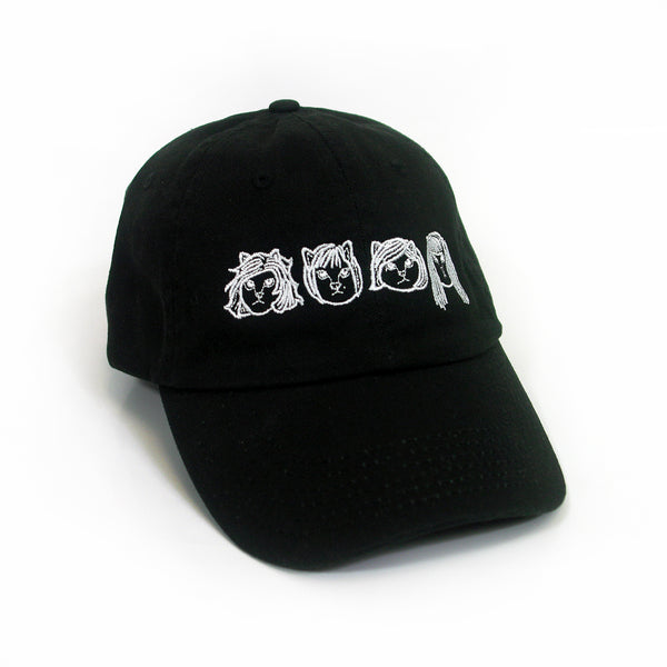 image of the front of a black dad hat on a white background. front of the hat  has the linda linda members as cats embroidered in white across the front