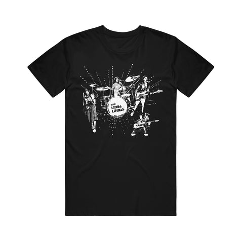 image of a black tee shirt on a white background. tee has center chest print in white of the four members of the band the linda lindas playing their instruments during a live concert